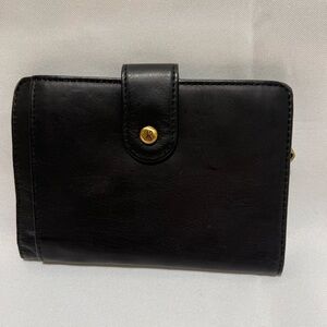 HOBO. Black passport wallet size 6 1/2 x 4 1/2 snap closure